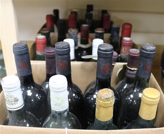 Thirty three assorted bottles of red and white wines including four Chateau Meyney, Saint Estephe, 1975.